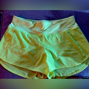Neon yellow Lululemon running shorts size 8